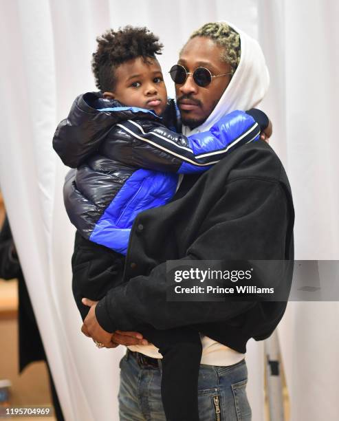 Future and Future Zahir Wilburn attend Free Wishes Foundation Interactive Winter Wonderland on December 22, 2019 in Atlanta, Georgia.