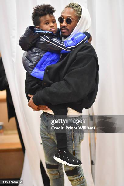 Future and Future Zahir Wilburn attend Free Wishes Foundation Interactive Winter Wonderland on December 22, 2019 in Atlanta, Georgia.