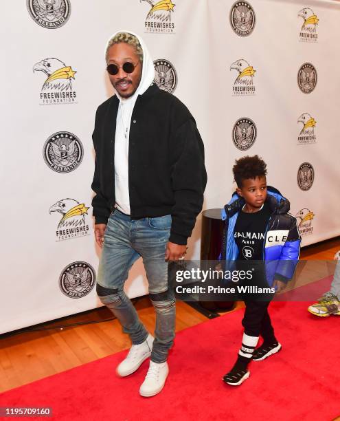 Rapper Future and Future Zahir Wilburn attend Free Wishes Foundation Interactive Winter Wonderland on December 22, 2019 in Atlanta, Georgia.