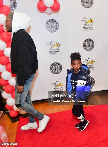 Rapper Future and Future Zahir Wilburn attend Free Wishes Foundation Interactive Winter Wonderland on December 22, 2019 in Atlanta, Georgia.