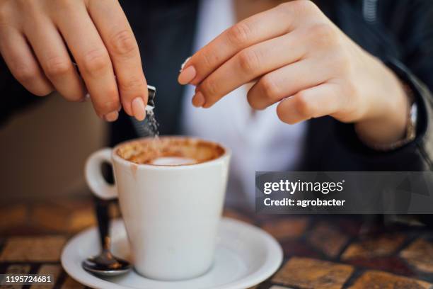 put sugar in coffee cup - sugar stock pictures, royalty-free photos & images