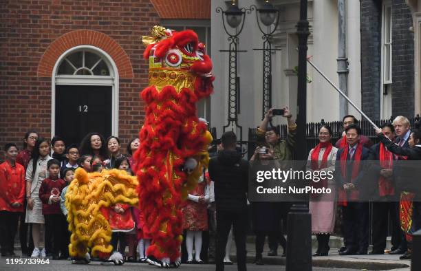 British Prime Minister Boris Johnson watches a performance during celebrations for Chinese Lunar New Year at Downing Street in London. On Friday, 24...