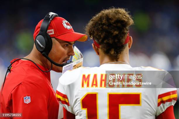 Kansas City Chiefs quarterbacks coach Mike Kafka talks with Kansas City Chiefs quarterback Patrick Mahomes during a regular season game between the...