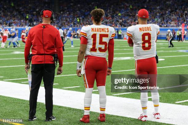 Kansas City Chiefs quarterback Patrick Mahomes , center, watches the action on the field along with Kansas City Chiefs quarterback Matt Moore ,...