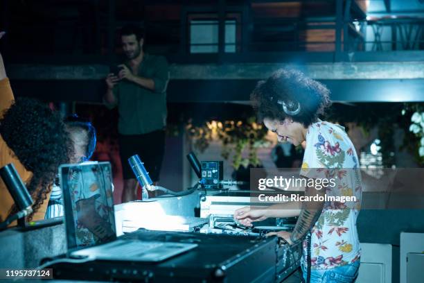 disc jockey playing at the disco party - dj club stock pictures, royalty-free photos & images