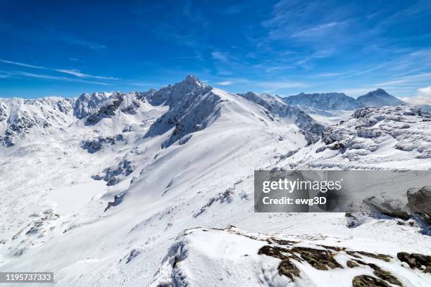 winter scene with high tatra mountains with swinica peak, poland - tatras slovakia stock pictures, royalty-free photos & images