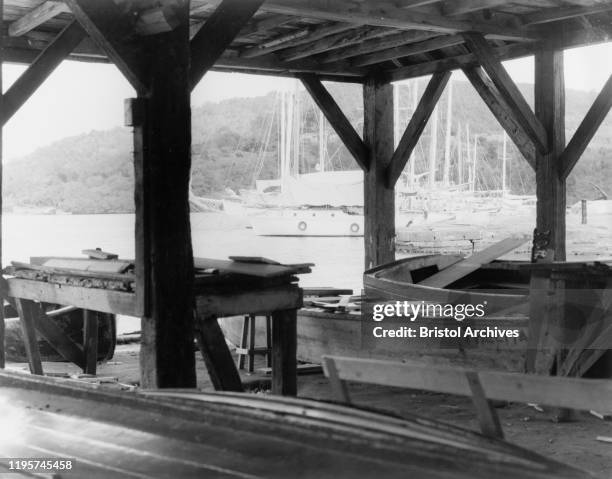 Antigua, A boat-building workshop at English HarbourWooden beams support the roof of a boat-building workshop on the waterfront at English Harbour....