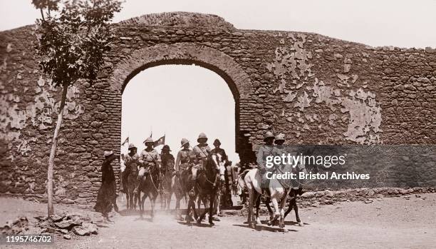 Sudan, Printed caption reads: 'H.R.H. The Duke of Connaught Leaving Omdurman By the South Gate. Published by G N Morhig, The English Pharmacy,...