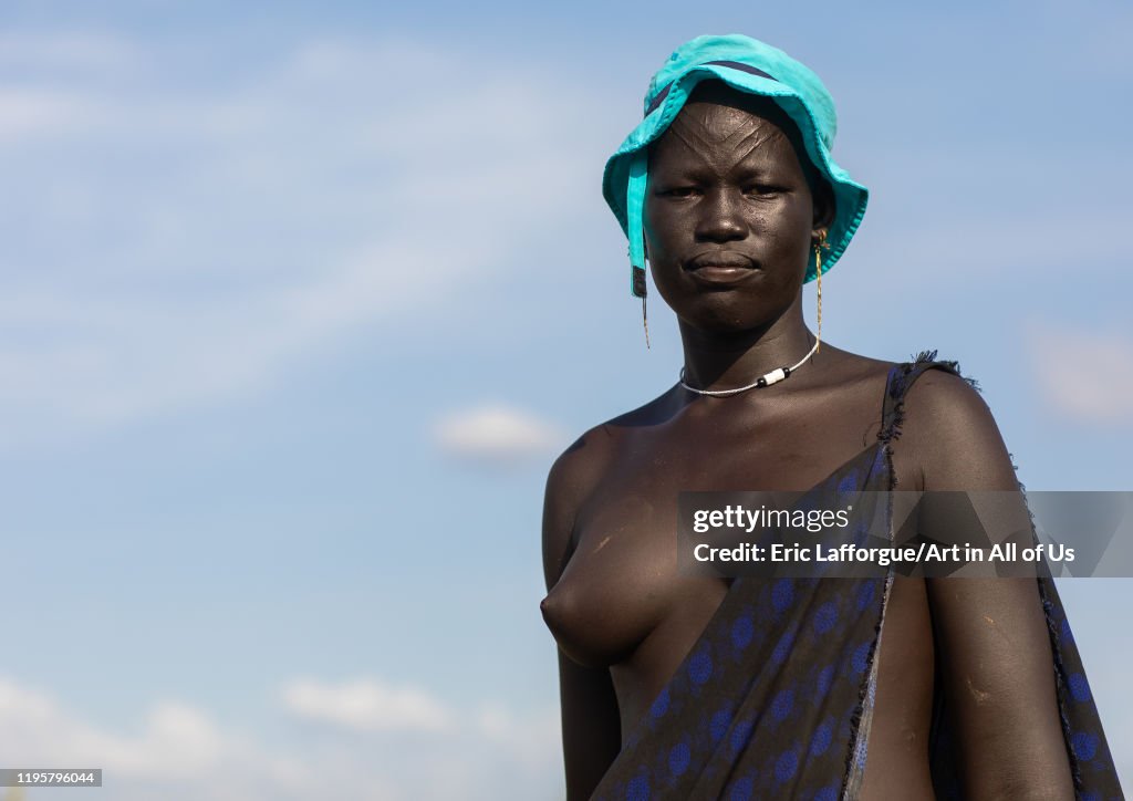 Portrait of a Mundari tribe woman with scarifications on the forehead, Central Equatoria, Terekeka, South Sudan