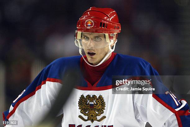 Forward Alexei Yashin of Russia looks on against the USA in the men's ice hockey semifinal during the Salt Lake City Winter Olympic Games at the E...