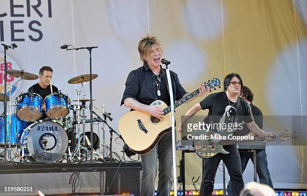 Goo Goo Dolls drummer Mike Malinin, singer/guitar player John Rzeznik and bass player Robby Takac perform on ABC's "Good Morning America" at Rumsey...