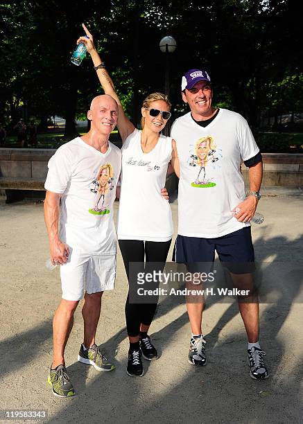David Kirsch and AOL CEO Tim Armstrong join Heidi Klum on her AOL Summer Run on July 22, 2011 in New York City.