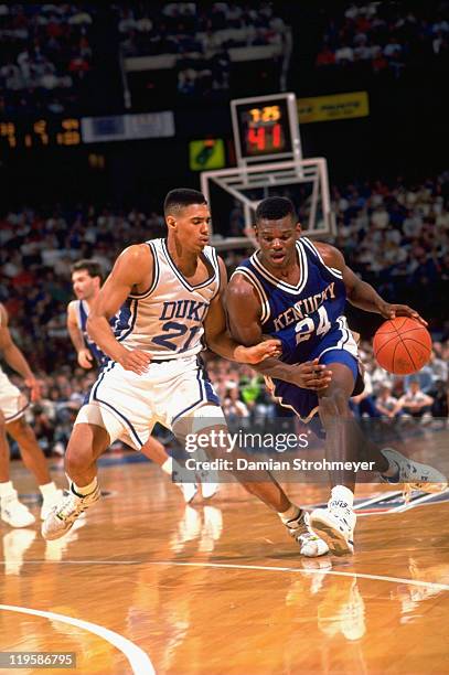 Playoffs: Kentucky Jamal Mashburn in action vs Duke Antonio Lang at The Spectrum. Philadelphia, PA 3/28/1992 CREDIT: Damian Strohmeyer