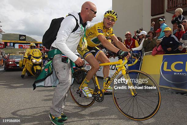 Thomas Voeckler of France and Team Europcar hears that he has failed to retain the race leaders yellow jersey after crossing the finishing line...