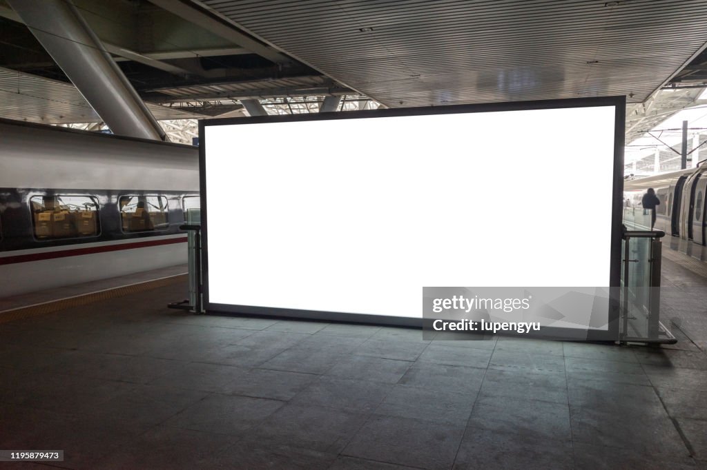 Blank billboard at railroad station