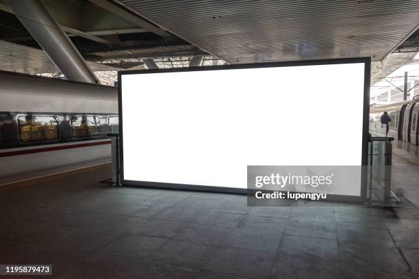 blank billboard at railroad station - billboard posting stock pictures, royalty-free photos & images