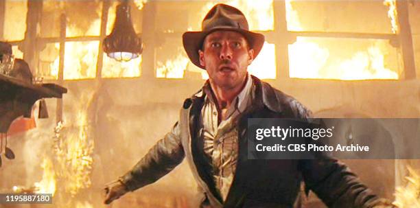 The movie: Indiana Jones and the Raiders of the Lost Ark , , directed by Steven Spielberg. Seen here, Harrison Ford as Indiana Jones. Initial...