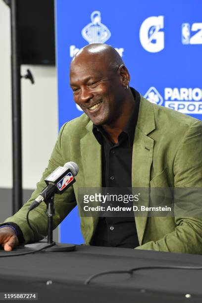Legend, Michael Jordan smiles and speaks to the media during a press conference before the Milwaukee Bucks game against the Charlotte Hornets as part...