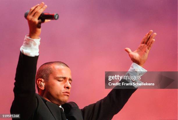 Italian singer Eros Ramazzotti performs live on stage at Amsterdam Arena in Amsterdam, Netherlands on 26th August 1996.