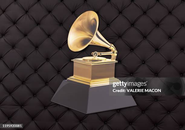 The famous gold gramophone best know as the Grammy logo is seen on a backdrop as the celebrity arrival area is being set up ahead of the 62nd Annual...