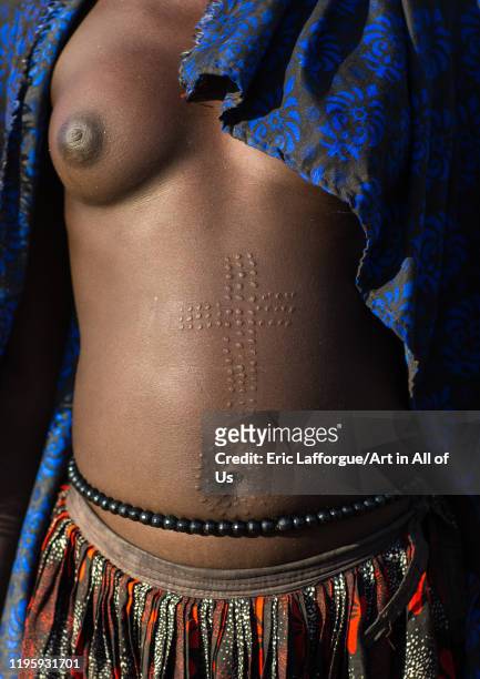 Mundari tribe woman scarifications on the belly in a cross shape, Central Equatoria, Terekeka, South Sudan on November 26, 2019 in Terekeka, South...