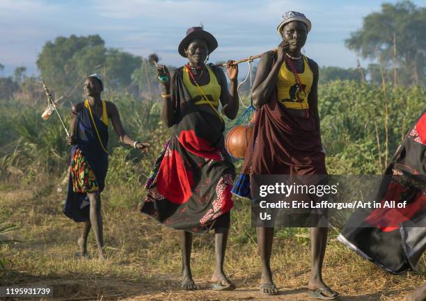 Mundari tribe women marching in line while celebrating a wedding, Central Equatoria, Terekeka, South Sudan on November 26, 2019 in Terekeka, South...