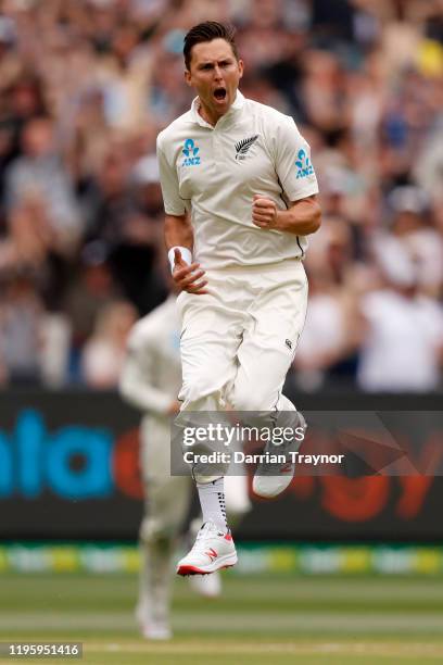 Trent Boult of New Zealand celebrates the wicket of Joe Burns of Australia during day one of the Second Test match in the series between Australia...