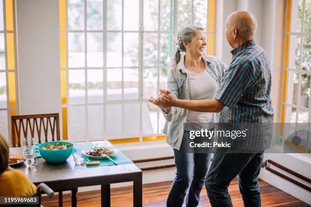 love in nursing home - senior man dancing on table stock pictures, royalty-free photos & images