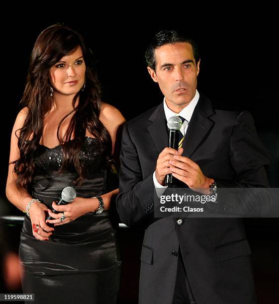 Mariana Echeverria and Michel Bauer during the presentation of new uniform of America soccer team on July 21, 2011 in Mexico City, Mexico.