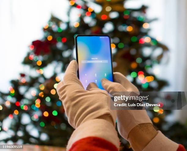 Santa Using Phone 229 Santa Hand Phone Stock Photos, High-Res Pictures, and Images ...