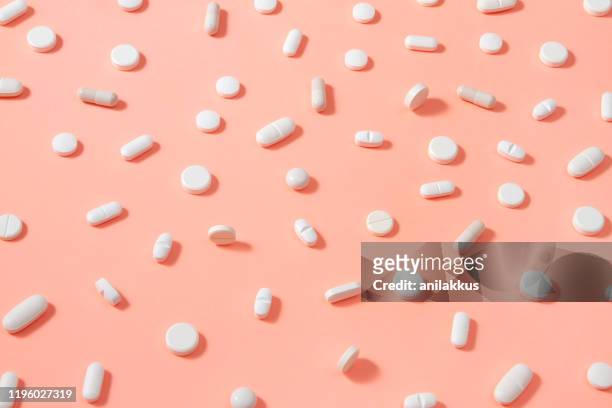 pills background - pill background stock pictures, royalty-free photos & images