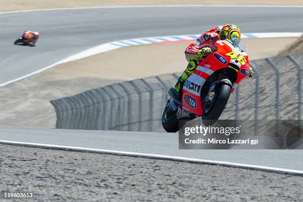 Valentino Rossi of Italy and Ducati Marlboro Team heads down a straight during the free practice of Red Bull U.S. Grand Prix at Mazda Raceway Laguna...