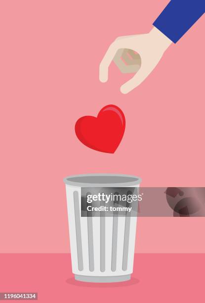 a man leaves a heart into the trash - marriage counseling stock illustrations