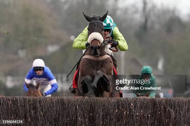 Sam Twiston-Davies riding Clan Des Obeaux clear the last to win The Ladbrokes King George VI Chase at Kempton Park Racecourse on December 26, 2019 in...