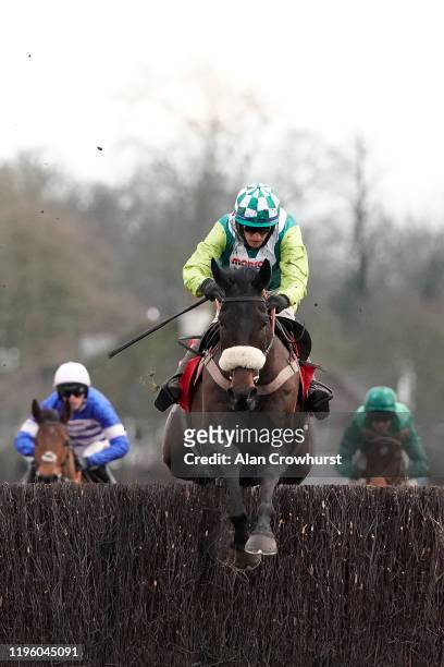 Sam Twiston-Davies riding Clan Des Obeaux clear the last to win The Ladbrokes King George VI Chase at Kempton Park Racecourse on December 26, 2019 in...