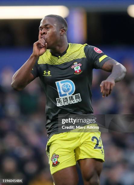 Michael Obafemi of Southampton celebrates after scoring his team's first goal during the Premier League match between Chelsea FC and Southampton FC...