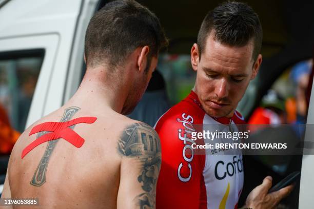 Confidis rider Fabio Sabatini and teammate Kenneth Vanbilsen of Belgium prepare for the start of stage five of the Tour Down Under UCI World Tour...