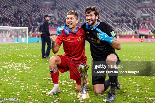 Roberto Firmino of Liverpool and Goalkeeper Alisson Becker of Liverpool celebrating after beating Flamengo during the FIFA Club World Cup Final match...