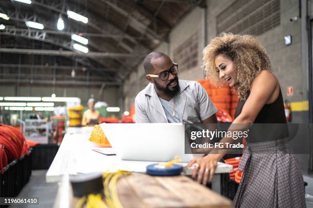 engineer and manager working together with laptop in the industry - mechanical engineering stock pictures, royalty-free photos & images