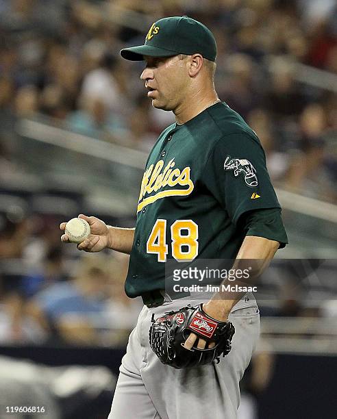 Michael Wuertz of the Oakland Athletics looks on against the New York Yankees on July 22, 2011 at Yankee Stadium in the Bronx borough of New York...