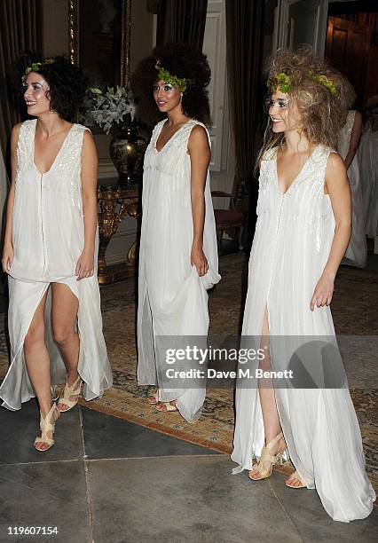 Fairies greet guests as they arrive at a party to celebrate the renovation of Easton Neston and to welcome designer Leon Max to his new headquarters...