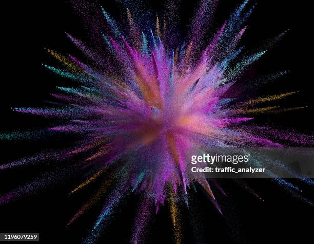 explosión de polvo colorido - combustion fotografías e imágenes de stock
