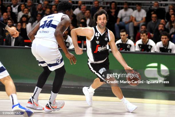 Milos Teodosic of Virtus Segafredo competes with Henry Sims of Pompea during the LBA LegaBasket italian championship of Serie A 2019/2020 match...