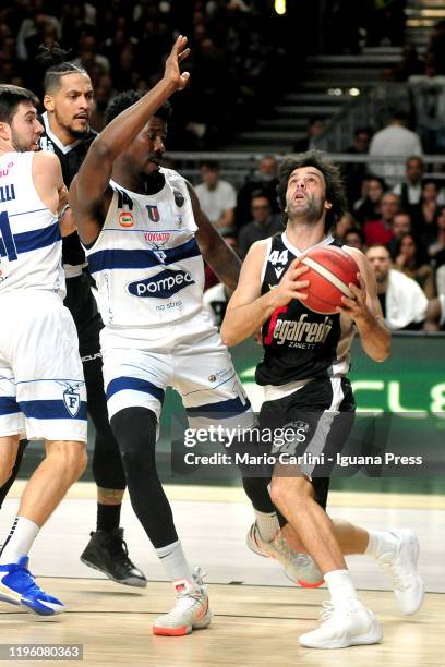Milos Teodosic and Julian Gamble of Virtus Segafredo competes with Henry Sims and Matteo Fantinelli of Pompea during the LBA LegaBasket italian...