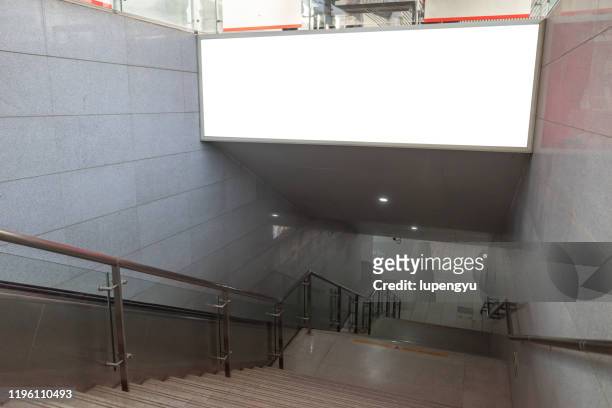 blank billboard in underground hall or subway - ad mockup stock pictures, royalty-free photos & images