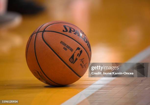 The official game ball rests on the court during the game between the Los Angeles Lakers and the Los Angeles Clippers at Staples Center on December...