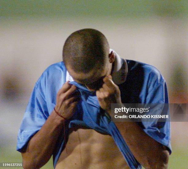 Sebastian Rivas, of Uruguay soon leaves the filed at the end of the game against Argentina 04 February, 2000 in Londrina, Brazil. Argentina won over...