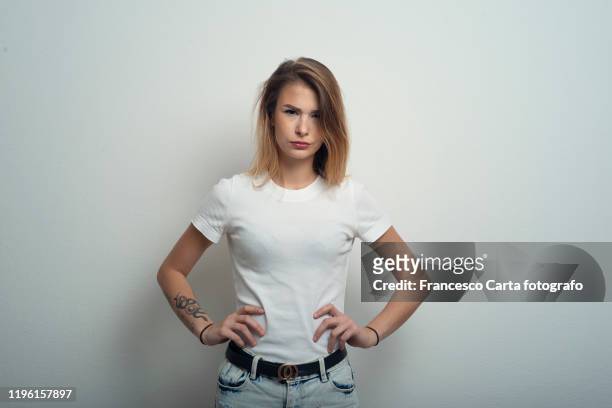 provocative woman - one woman only t-shirt stock pictures, royalty-free photos & images