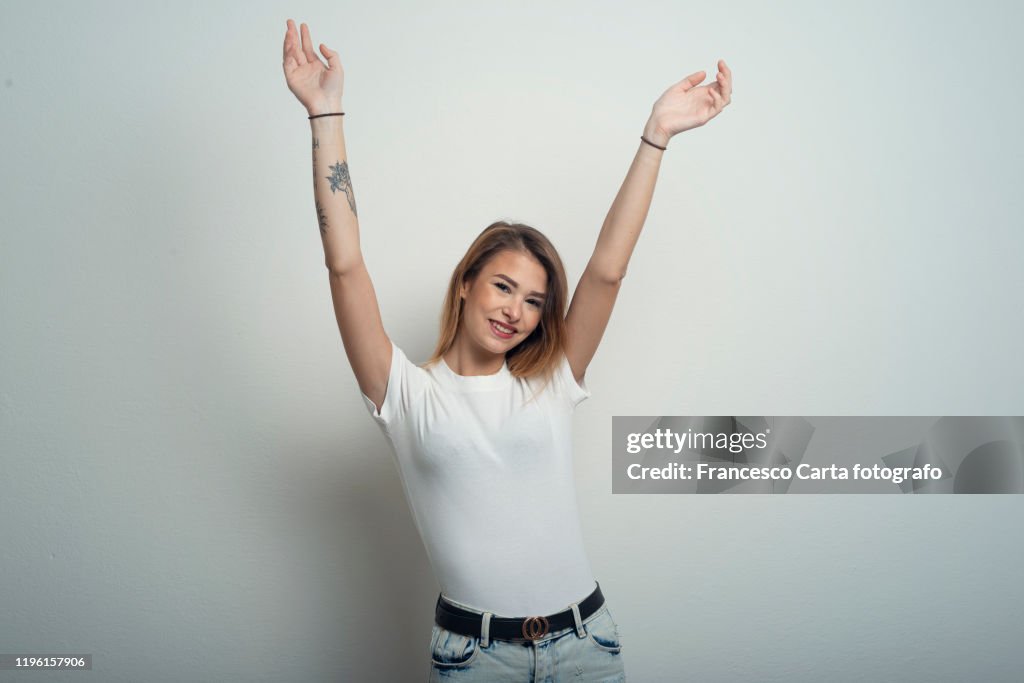 Woman with arms outstretched