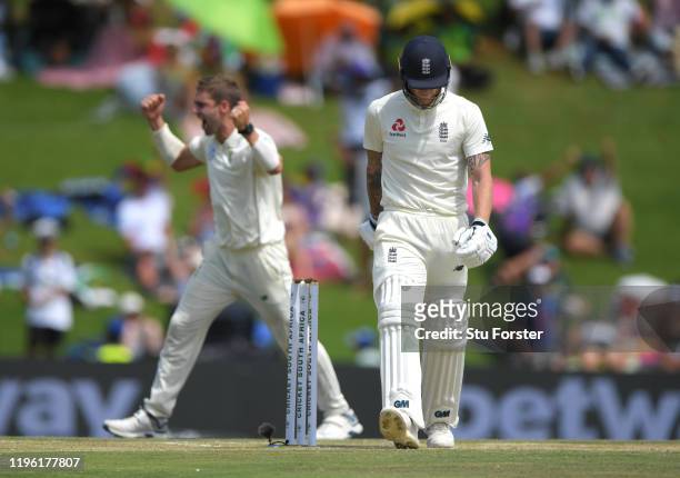South Africa bowler Anrich Nortje celebrates after dismissing Ben Stokes who walks off the field during Day Two of the First Test match between...